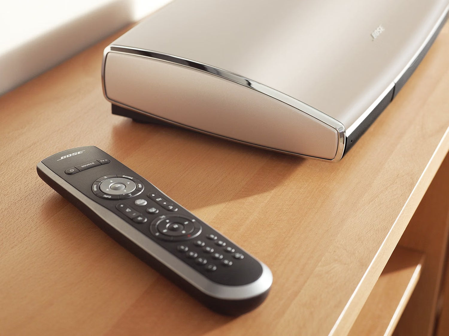 Bose Lifestyle T20 control console and remote in home theater setup